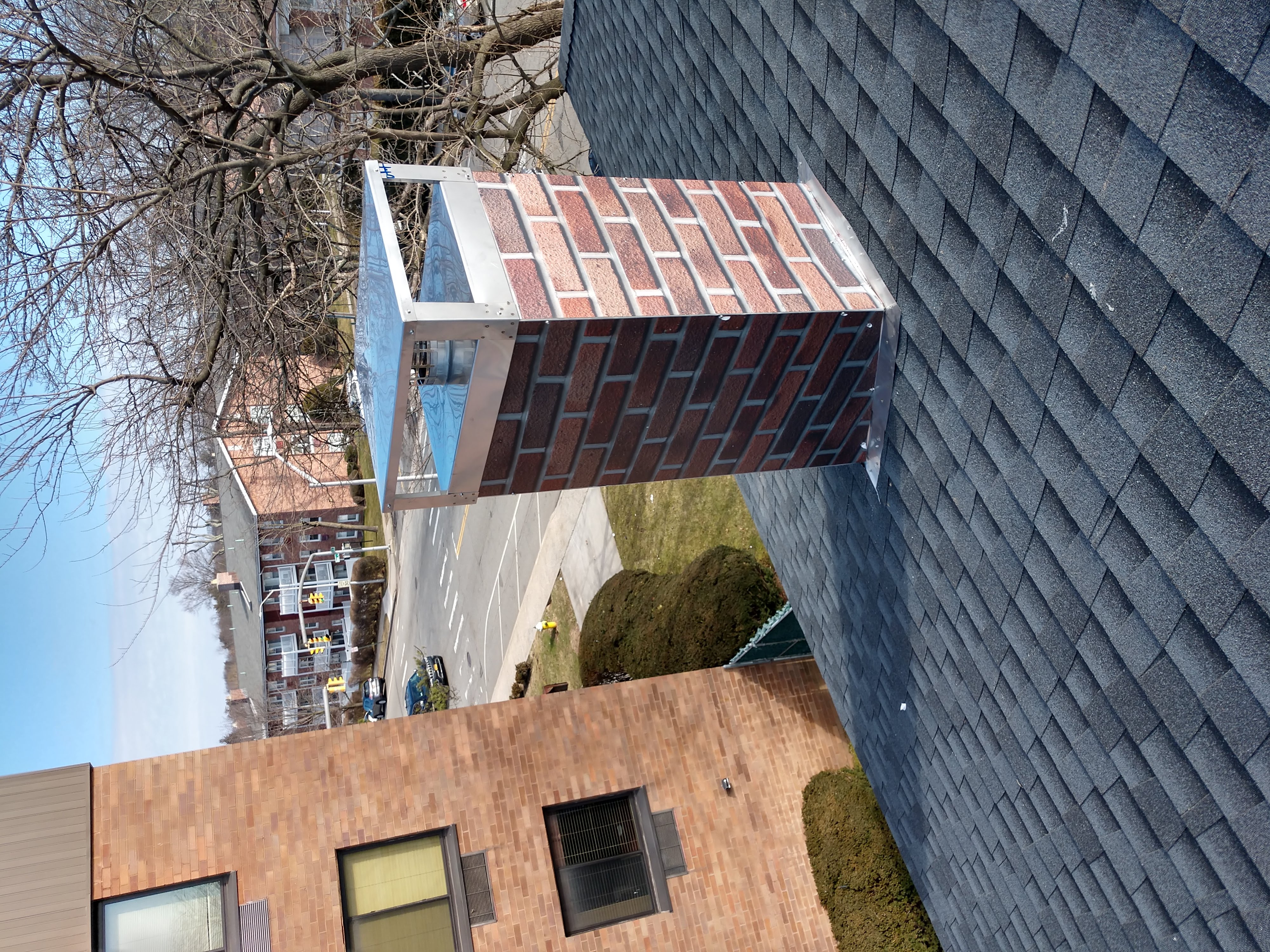 New elastomeric sealant applied to chimney crown in Albertson, NY
