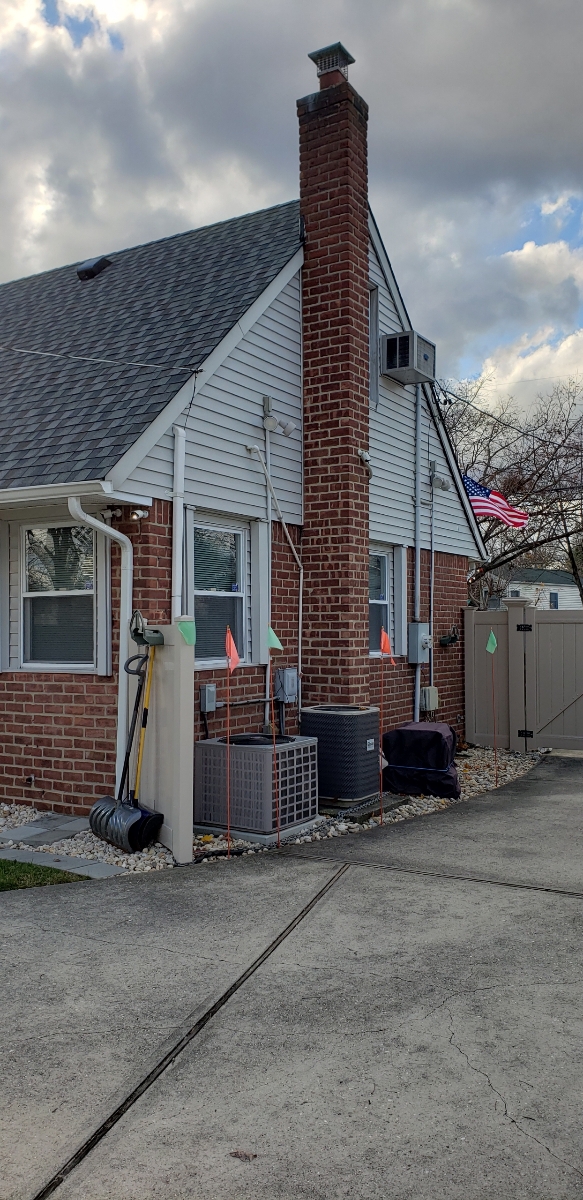 Professional chimney repointing restoring brick joints in Albertson, NY